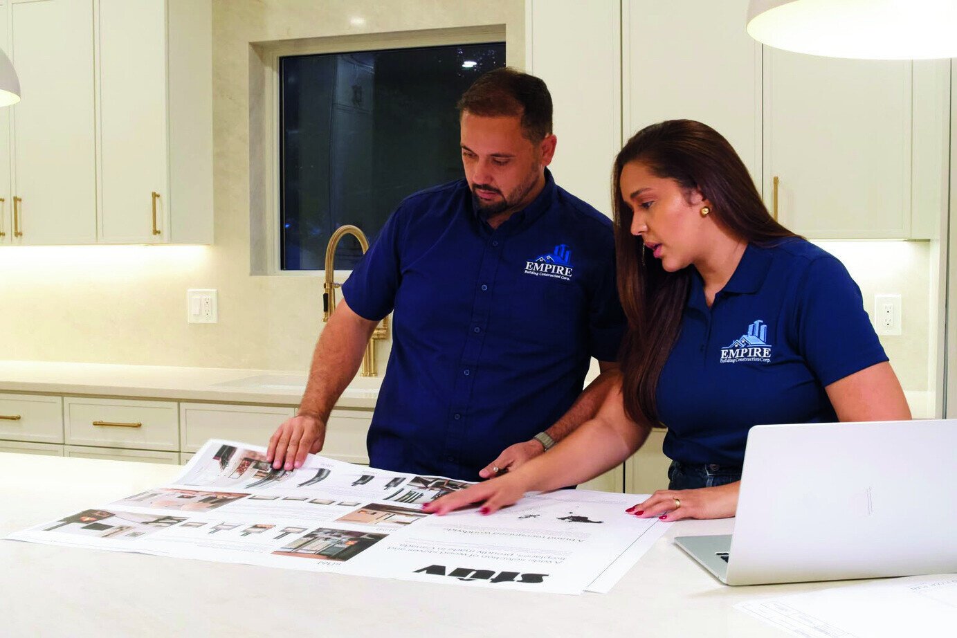 Jefferson and Lailla Escola reviewing project plans